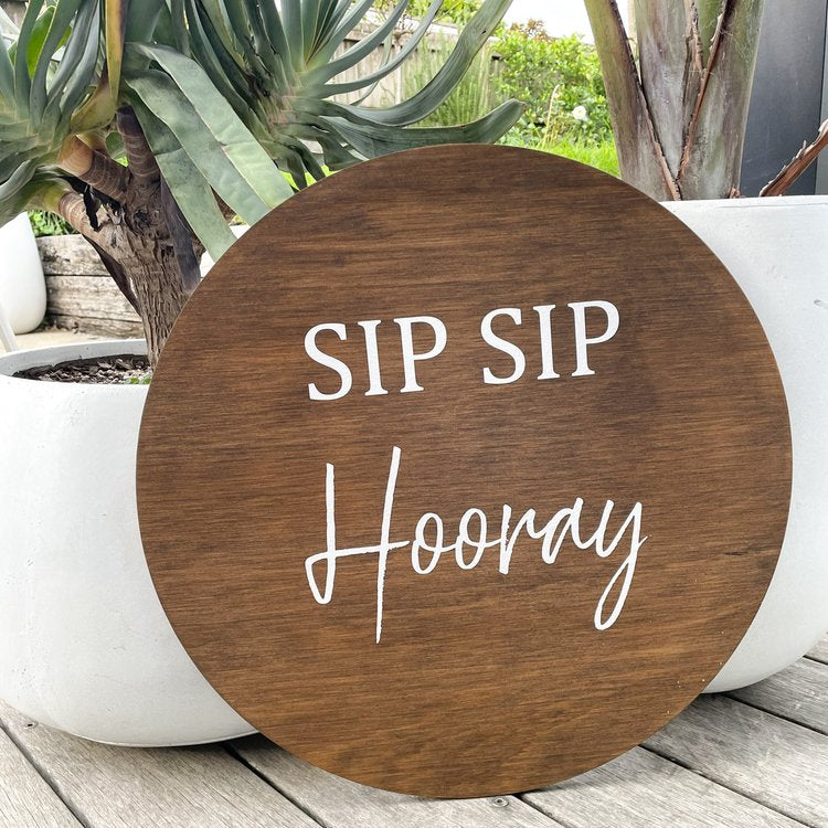 Sip sip Hooray round sign for hire